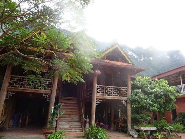 In a pretty wooden&nbsp;house.